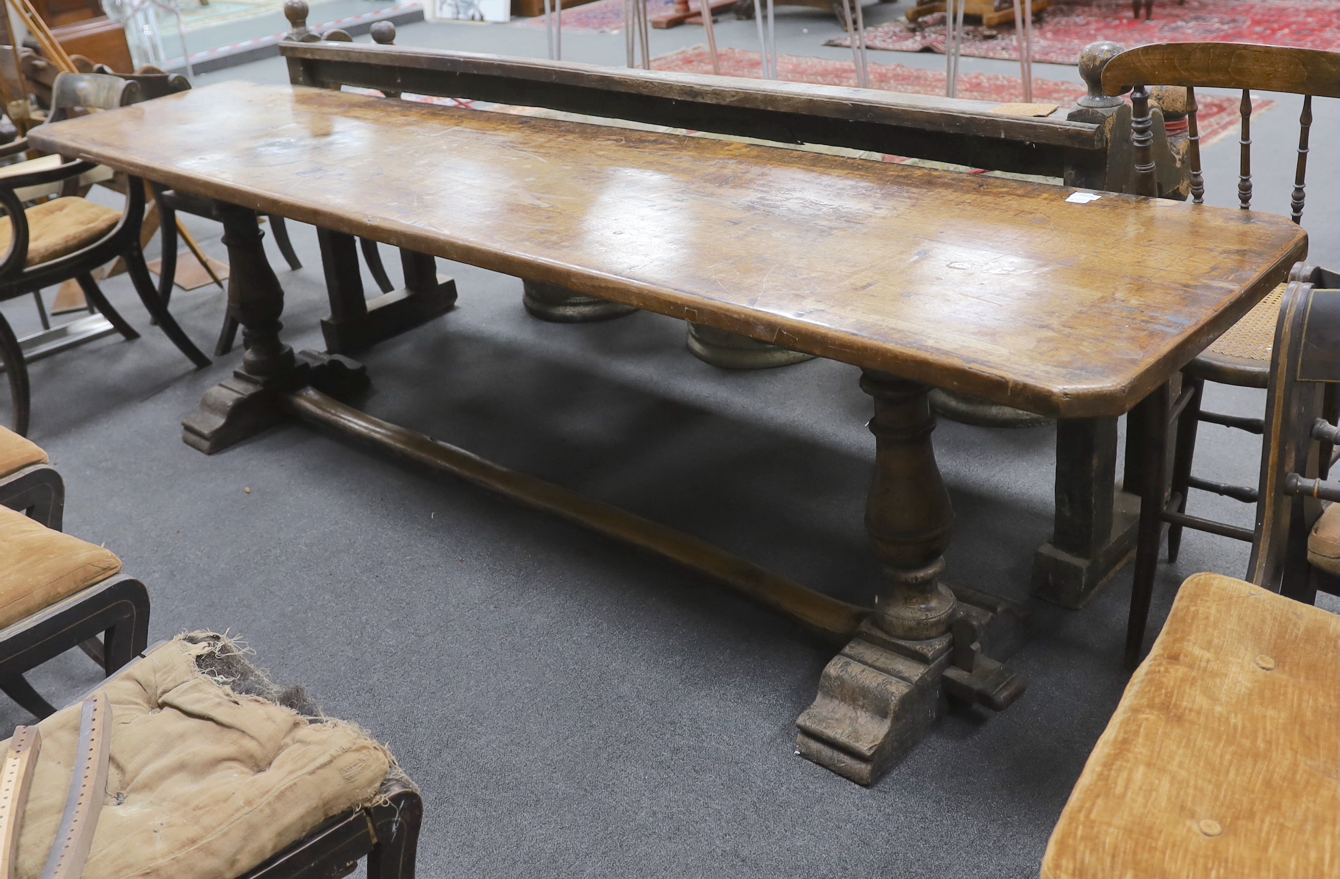 An 18th century style walnut refectory table, width 270cm, depth 59cm, height 74cm, Provenance- Brede Place, East Sussex, a former residence of the Frewen family from 1712-1936.